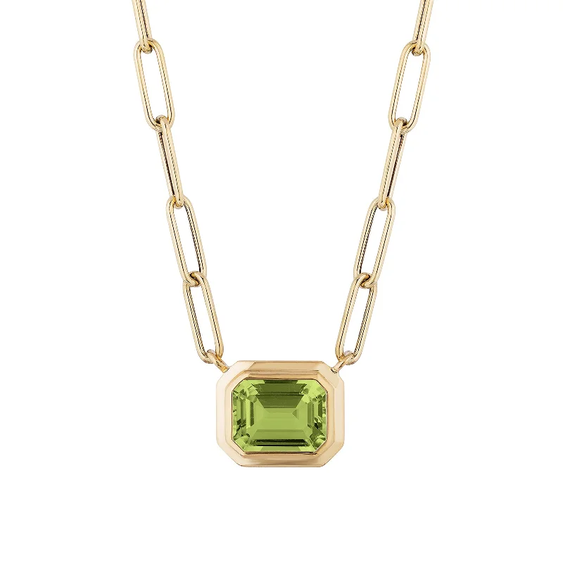 Shop High-Quality Jewelry At Jaw-Dropping Discounts Peridot Emerald Cut East West Pendant